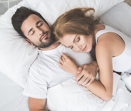 Man and Woman Sleeping