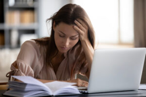 woman sitting with laptop